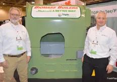 Triple Green Products Mike Kinsey, Rob Horst says their biomass boilers are used on farms for heating.